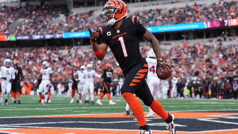 Cincinnati Bengals wide receiver Ja'Marr Chase (1) celebrates after scoring a touchdown during...