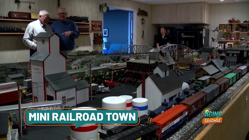 The tiny town has nine trains, a highway, fairgrounds and a village where each business is...