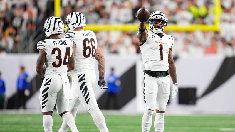 Cincinnati Bengals wide receiver Ja'Marr Chase (1) gestures during an NFL football game...