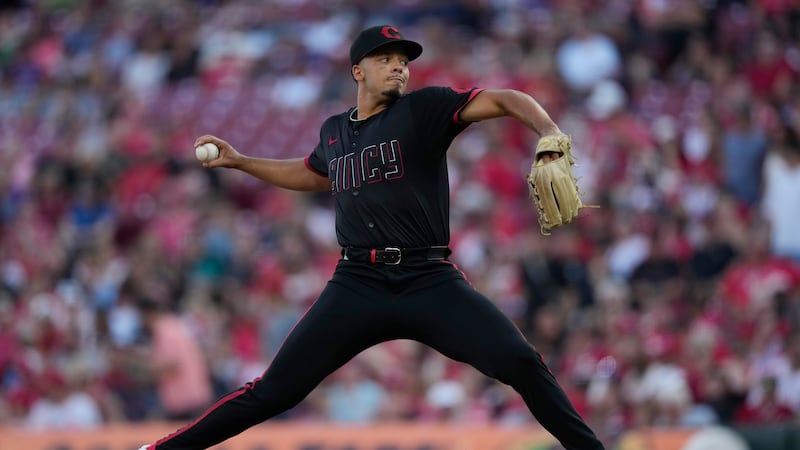 Cincinnati Reds pitcher Chase Burns throws during the second inning of a baseball game against...