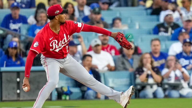 Cincinnati Reds starting pitcher Hunter Greene (21) throws a pitch in the first inning of the...
